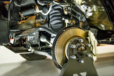 A vehicle having disc brakes repaired in a mechanic garage
