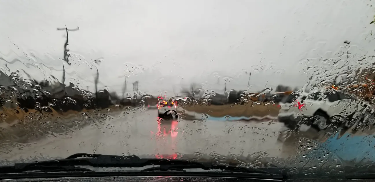 Fall Rain School Run rainy morning school run seen through a wet windshield