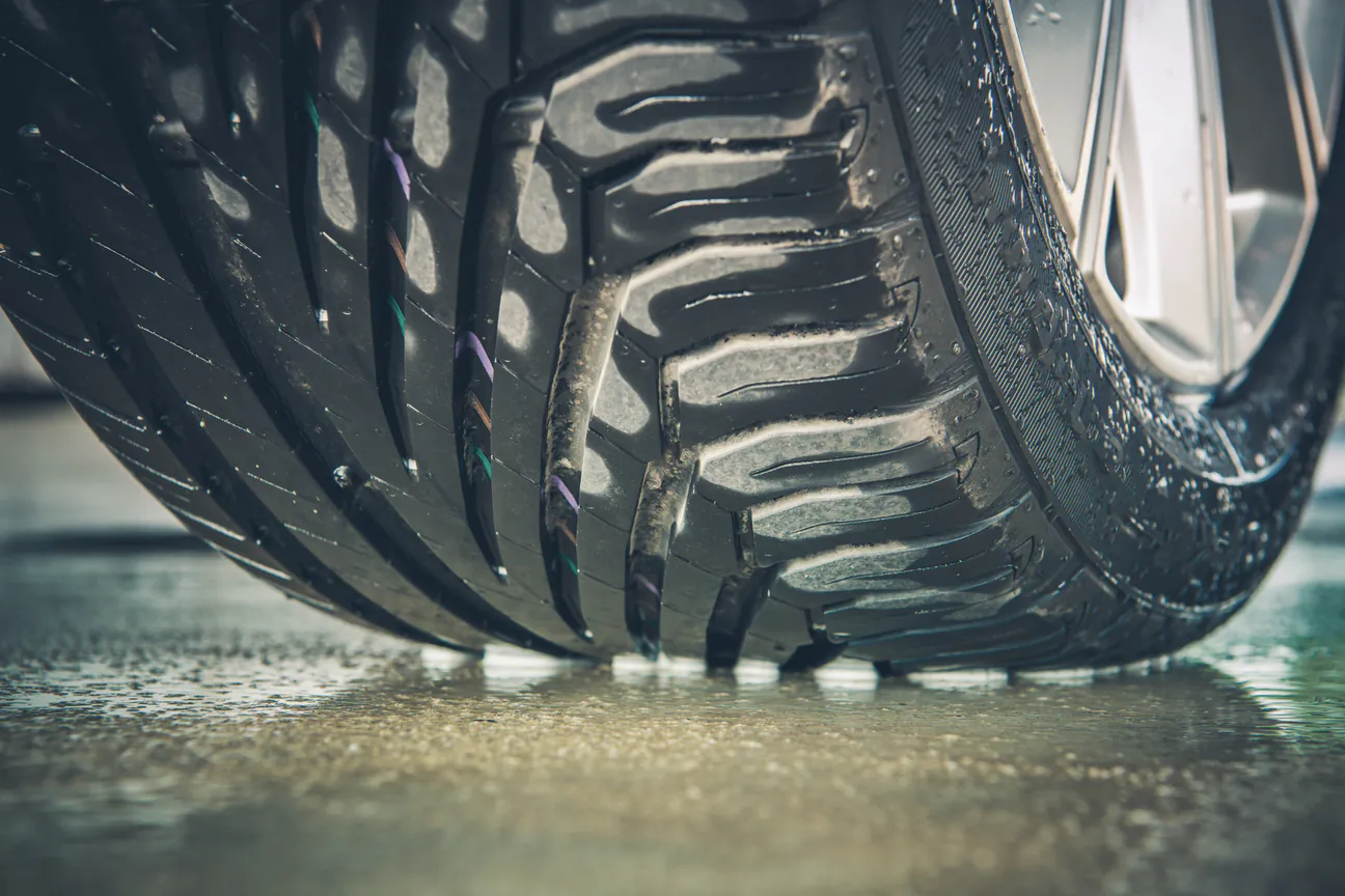 Tire Tread on Wet Road tire tread gripping a wet road surface